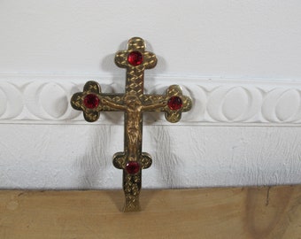 Vintage goldtone metal pectoral crucifix with red jewels. 5.5 x 3.75 inches