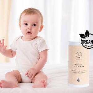 May include: A white jar of organic baby powder with a green leaf logo that says "ORGAN 100% NATURAL". The jar is labeled "Lizush Organic Baby Powder" and says "Absorbs excess moisture to keep skin dry and soft".