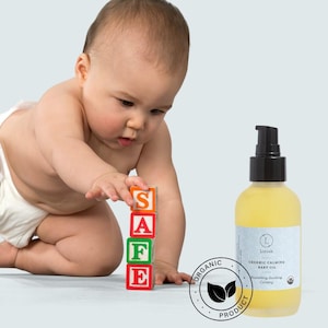 Gentle care for your little one with soothing ORGANIC baby massage oil. 🌿👶 #BabyCare #NaturalOil #InfantMassage #MomLife #ParentingTips #GentleTouch #BabyLove #NewMom #BabyRoutine #TenderMoments