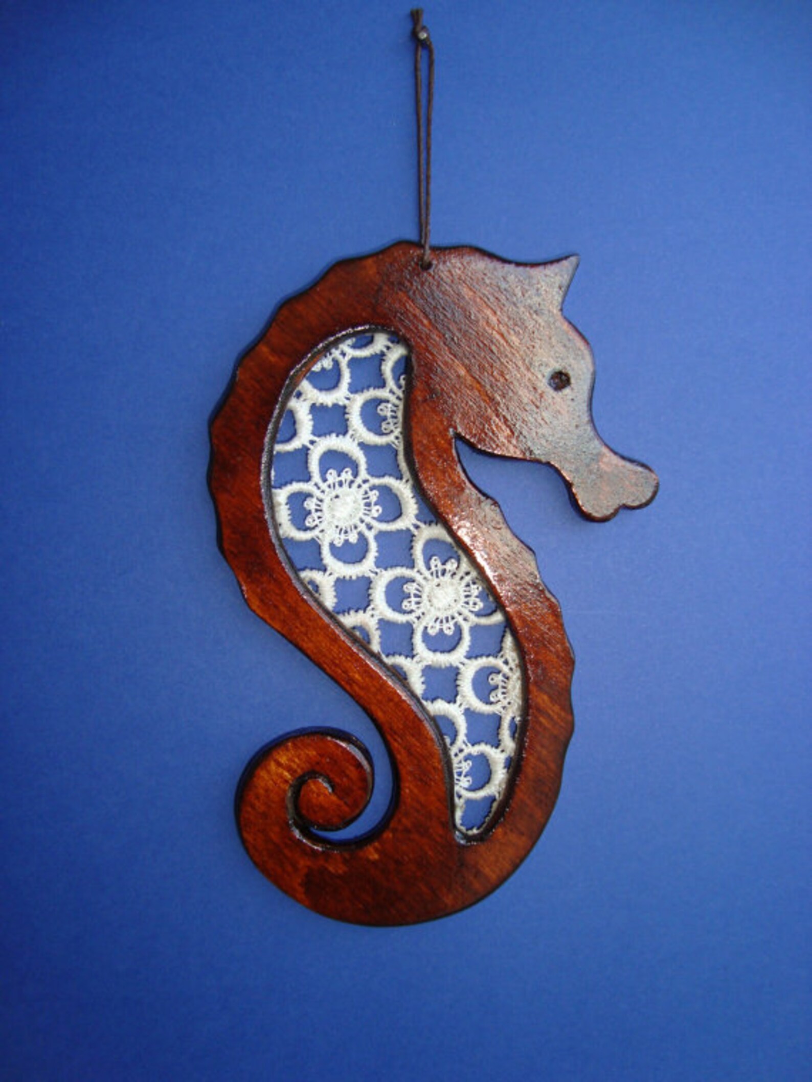 Handmade wooden seahorse wall hanging with lace inset. Etsy