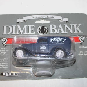 May include: A die-cast metal replica of a blue 1932 AGWAY delivery truck. The toy truck is a 1/43 scale model and is a 1993 Limited Edition. The packaging reads "Treasure Classic" and "Dime Bank".