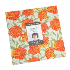 May include: A fabric square with a white background and a floral pattern of orange and yellow peonies. The fabric is labeled "Moda Garden Society".