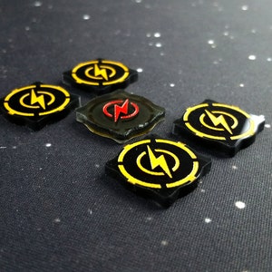 Double-sided charge tokens for use with X-wing 2.0