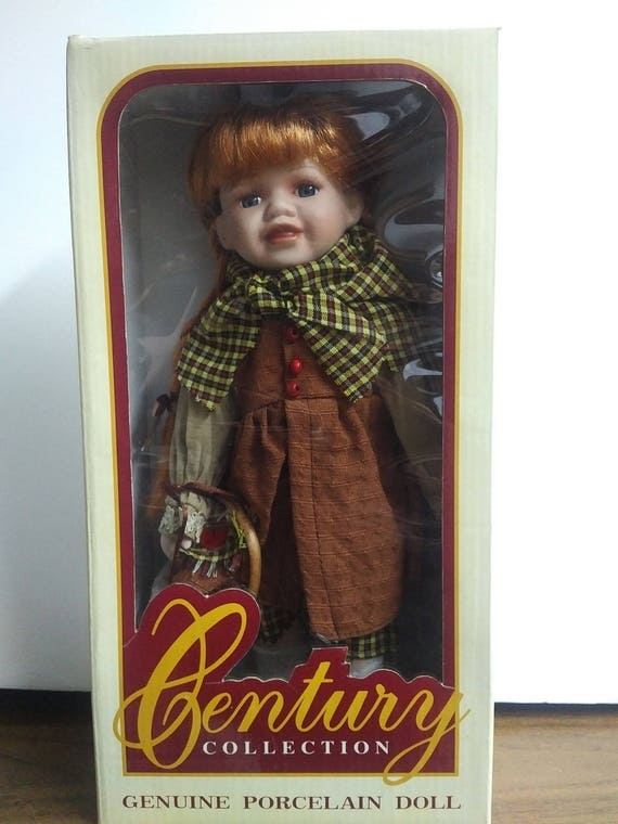 century collection genuine porcelain doll
