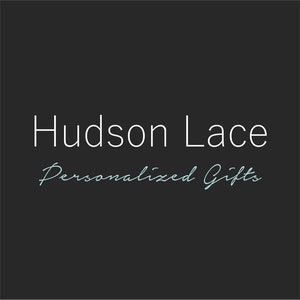 May include: White text on a black background reads "Hudson Lace Personalized Gifts".