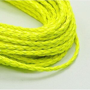 May include: A close-up of a bright yellow braided cord. The cord is made of a soft, pliable material and is perfect for crafting projects.