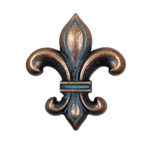 May include: A bronze fleur-de-lis with a blue and green patina finish. The fleur-de-lis is a traditional symbol of royalty and is often used in decorative art.