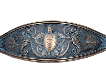 Tirador de cajón náutico con diseño de caballito de mar, tortuga y concha marina, decoración costera oceánica y playera, acabado en pátina de cobre.