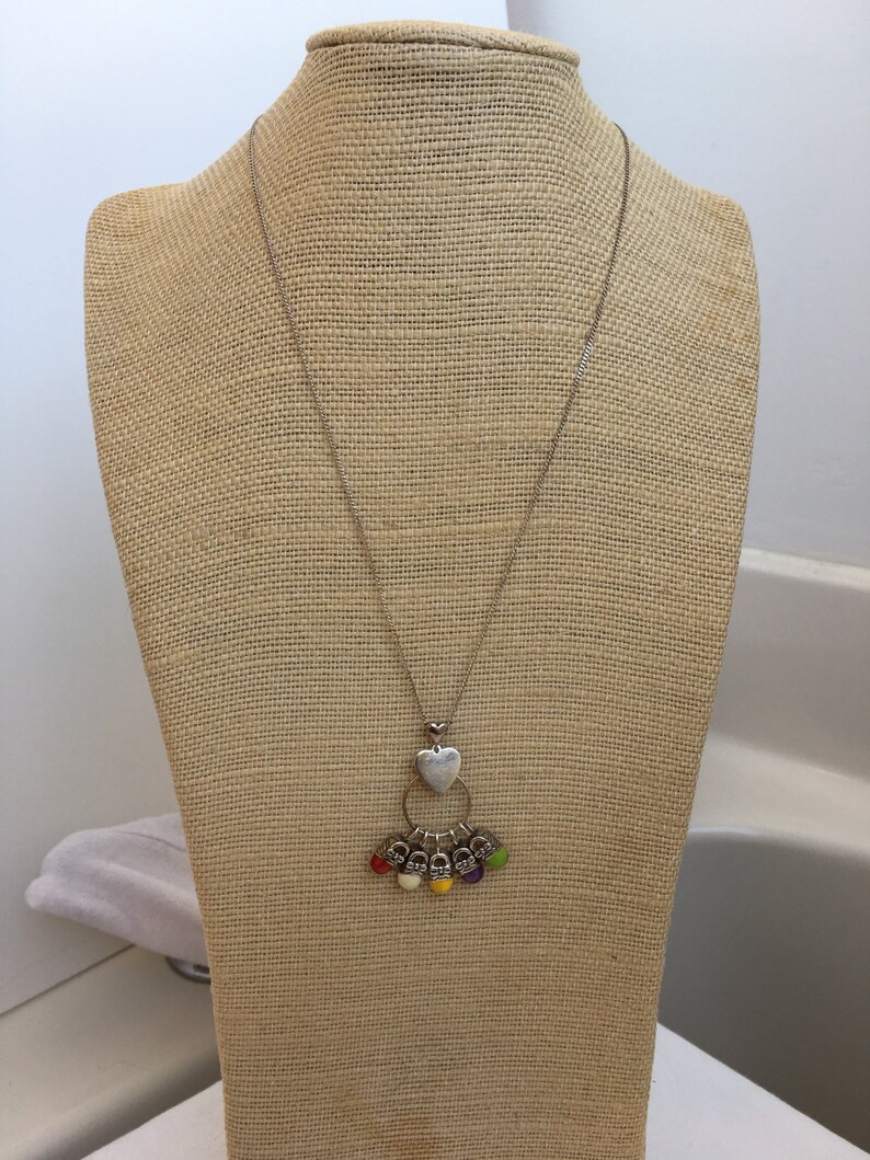 Sterling chain with charm holder and five enameled sneakers