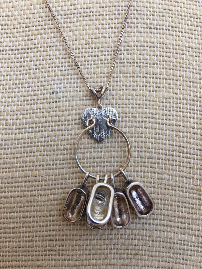 Sterling chain with charm holder and five enameled sneakers