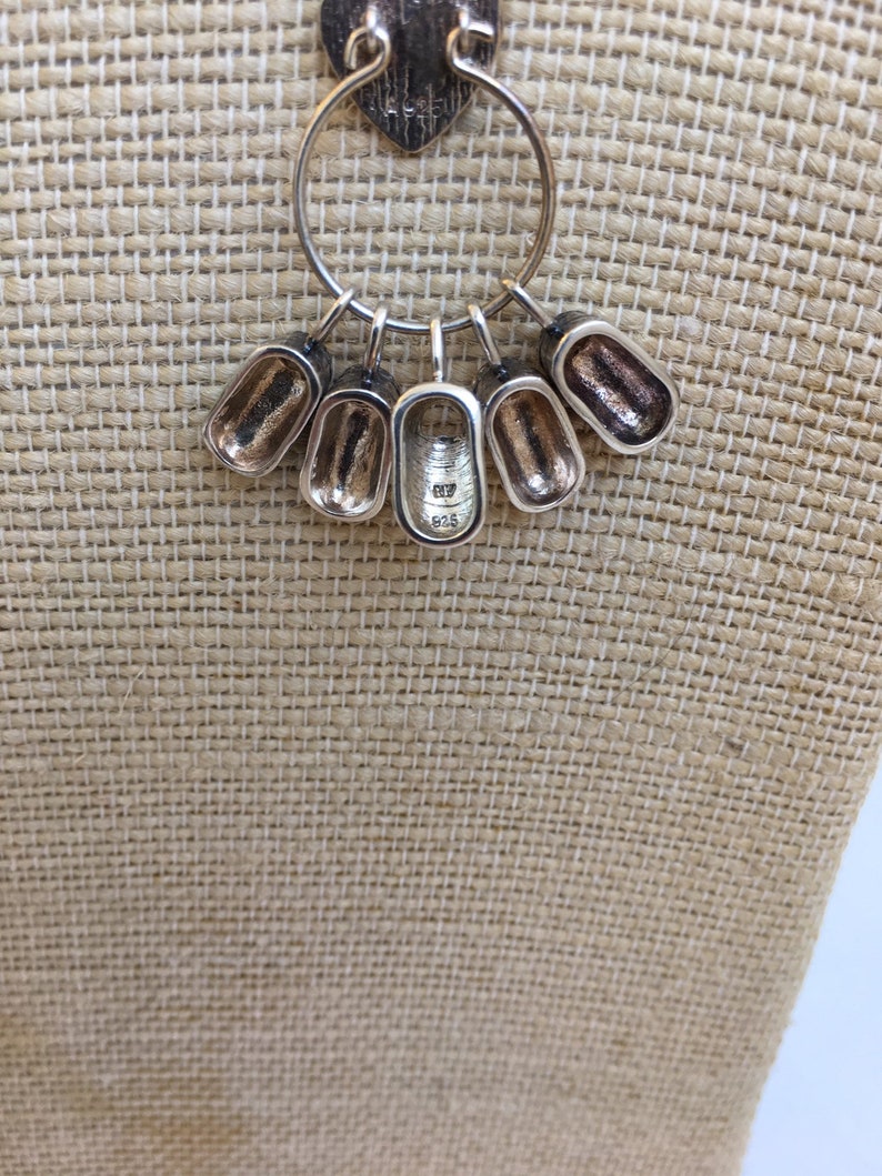 Sterling chain with charm holder and five enameled sneakers