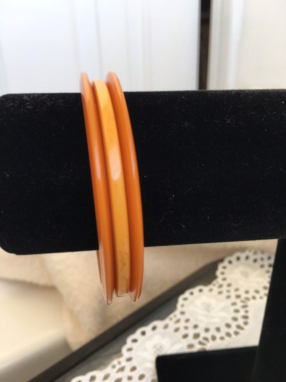 Three Art Deco butterscotch Bakelite bangle bracel