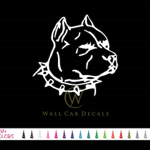 May include: White silhouette of a pit bull dog wearing a studded collar. The dog is facing to the right and has a serious expression. The image is on a black background. "Wall Car Decals" is written below the dog.