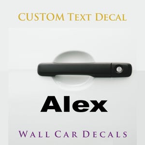 May include: A custom text decal featuring the name Alex in bold black lettering applied to a white surface below a black car door handle. The image includes the text CUSTOM TEXT DECAL at the top and WALL CAR DECALS at the bottom in purple.