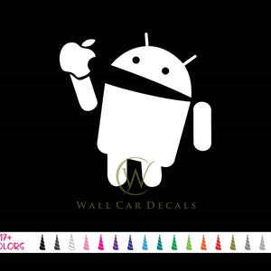 May include: White Android robot character taking a bite out of a green apple. The robot is wearing a black eye mask. The text "WALL CAR DECALS" is below the robot. There are 17+ color options for the decal.