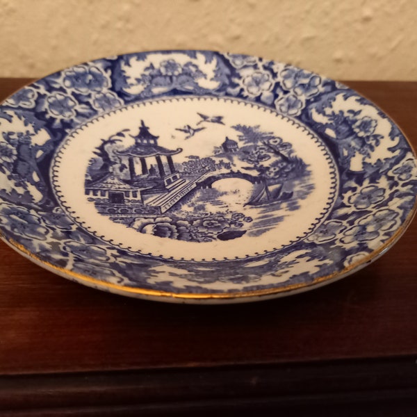 Olde Alton ware blue and white willow pattern saucer