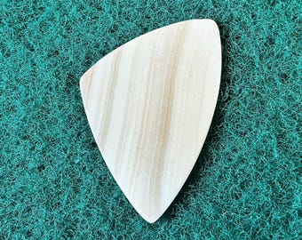 Seashell guitar pick/0.7mm thick, asymmetrical shape... by BeachSidePicks.