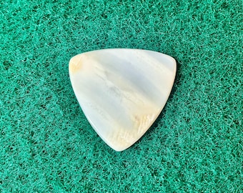 Seashell guitar pick/1.3mm thick, triangular shape... by BeachSidePicks.