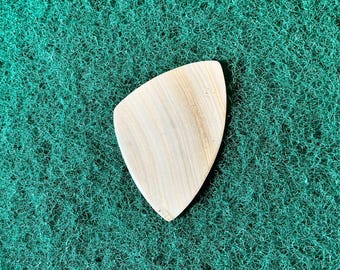 Seashell guitar pick/1.5mm thick, asymmetrical shape... by BeachSidePicks.