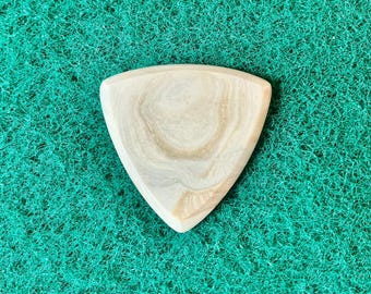 Seashell guitar pick/3.3mm thick, triangular shape... by BeachSidePicks.