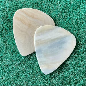 Two seashell guitar picks/1.0mm thick. Classic profile... by BeachSidePicks.