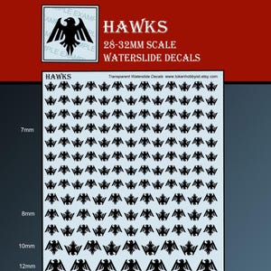 May include: Sheet of waterslide decals featuring a repeating pattern of black hawk silhouettes. The sheet includes the text "HAWKS" and "28-32MM SCALE WATERSLIDE DECALS". Measurements are provided in millimeters, ranging from 7mm to 12mm.