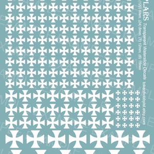 May include: A sheet of waterslide decals featuring white Templar crosses in various sizes, ranging from 3 mm to 15 mm. The decals are printed on a transparent sheet and are ideal for model making and crafts.
