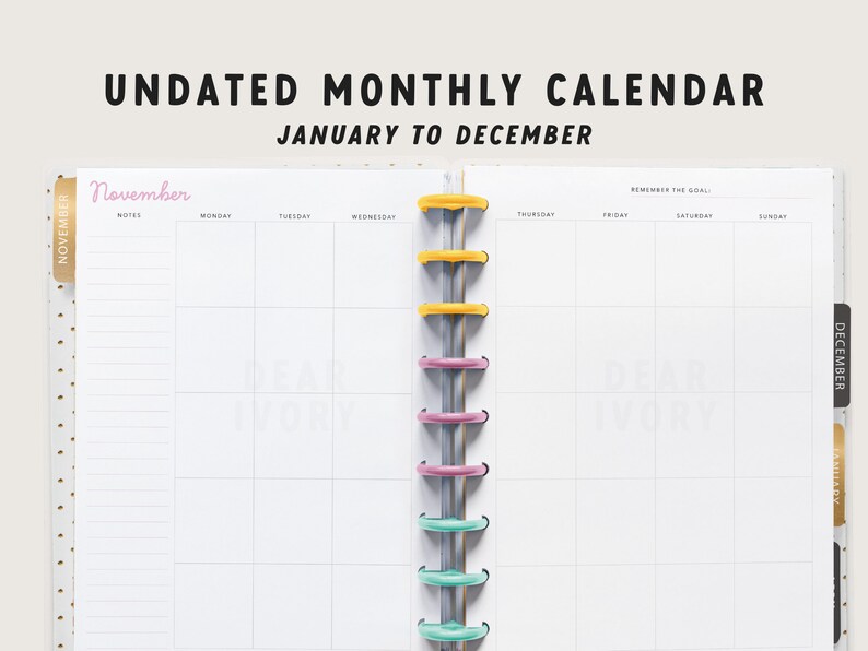 May include: An open, undated monthly calendar with the text "UNDATED MONTHLY CALENDAR JANUARY TO DECEMBER." The calendar is white with a colorful binding and tabs for November and December. The word "November" is in pink.