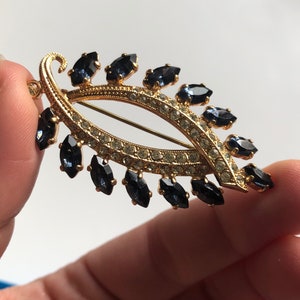 Vintage Mid Century Gold Tone and Sapphire Blue Rhinestone Leaf Shaped Brooch