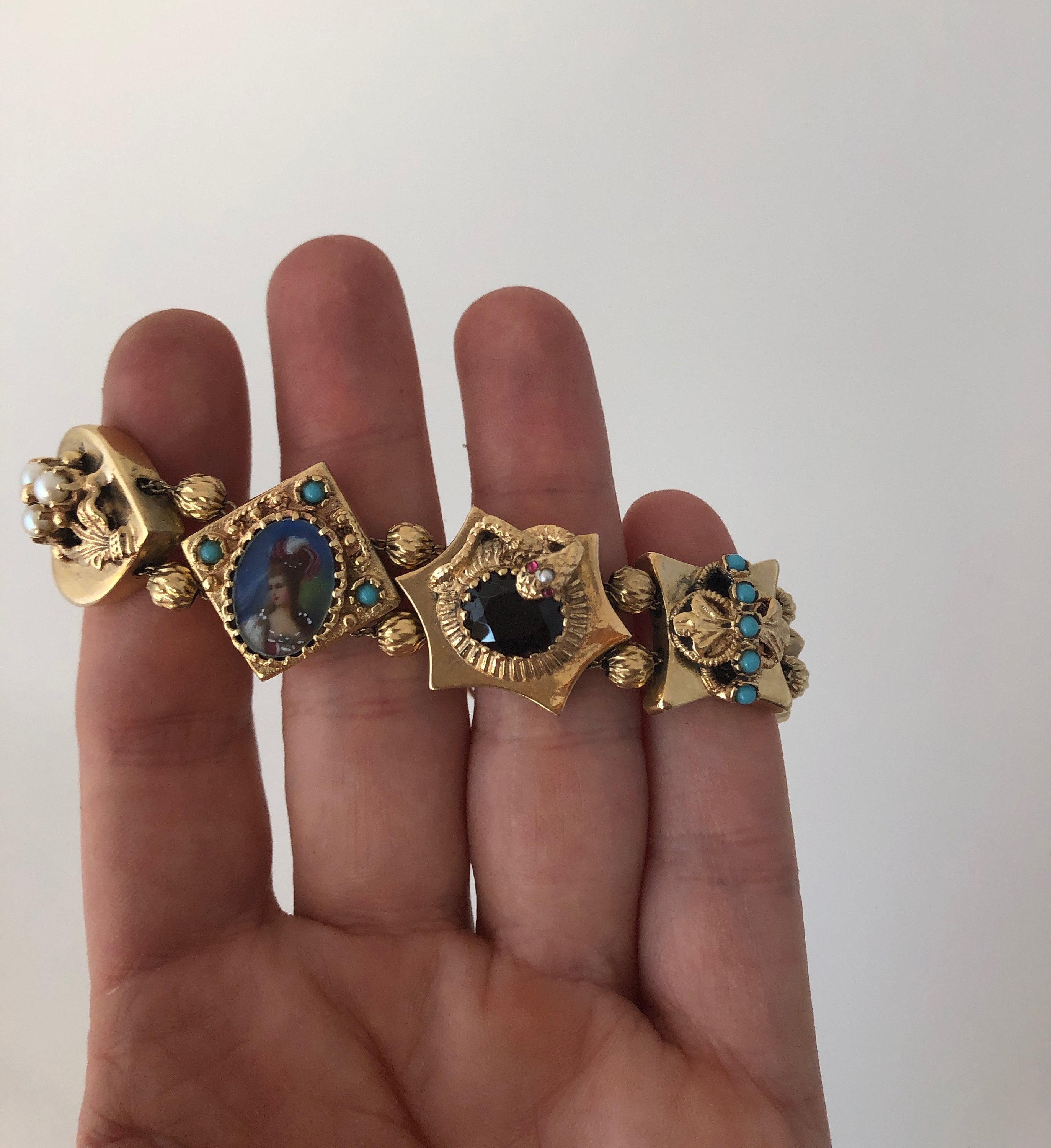 Late 1800s Slide Bracelet, Mixture Of 14K, 10K, And Gold Filled Charms –  Yarnal Jewelers