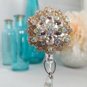 Brilliance.  Shiny, Sparkly Gold and Rhinestone Badge Holder