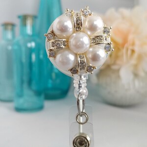 Diana.  Badge and ID Holder.  Ivory Pearls in Golden Bands of Clear Rhinestones.