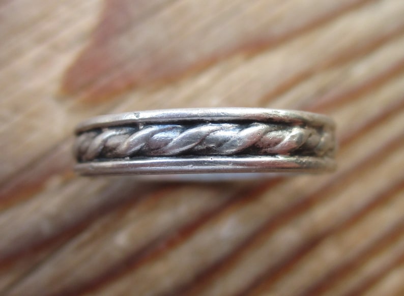 braided Viking style Scandinavian 925 jewelry Finland Koruseppa Oy inscription inside Finnish sterling silver twisted plait narrow band