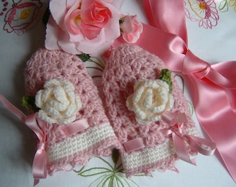 Hand crocheted fingerless gloves for girls with two decorative roses. Crochet girl, romantic and feminine fashion.