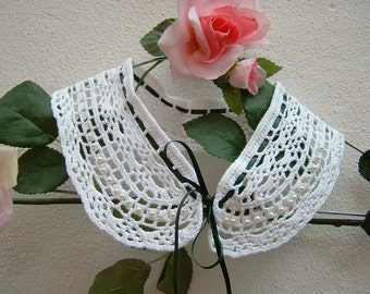 Hand crocheted white lace collar. Crochet women's fashion in a romantic and feminine style. Cotton collar.