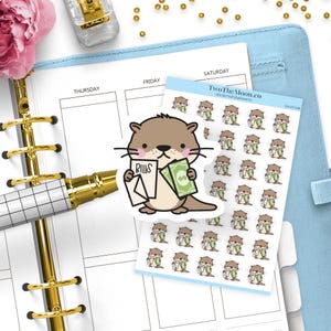 以下が含まれることがあります： BILLSと書かれた白い封筒と緑色の紙幣を持つ、漫画のラッコの小さなイラストが複数描かれたステッカーシート。ラッコは茶色の毛並み、クリーム色の腹部、ピンク色の頬をしている。上部にはブランド名TwoTheMoon.coが印刷されている。