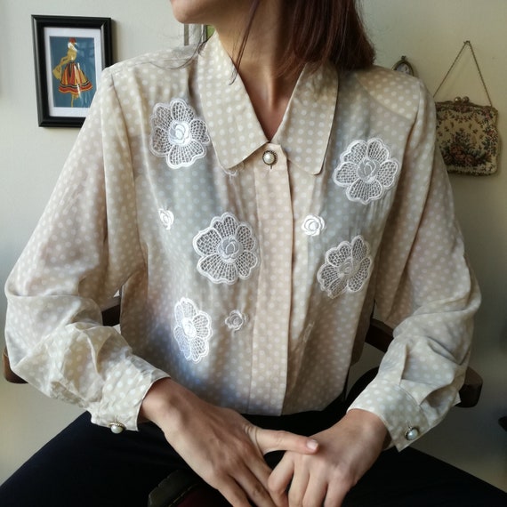 beige polka dot top