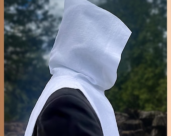May include: A white linen hood with a long, flowing design. The hood is made of a soft, lightweight fabric and has a simple, elegant style.