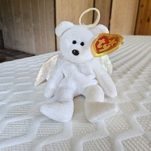 Rare 1st Edition Halo TY Beanie Baby with multiple errors. Brown nose, tush tag error, poem errors,  iridescent wings, and more
