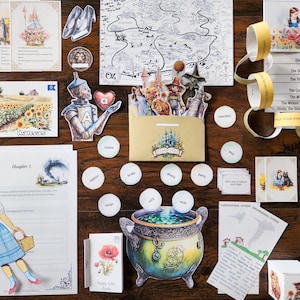 May include: A set of printable Wizard of Oz themed party supplies, including a map, character cutouts, a cauldron, a poppy field, and a paper doll. The set also includes a printable storybook chapter, a word game, and a character identification game.