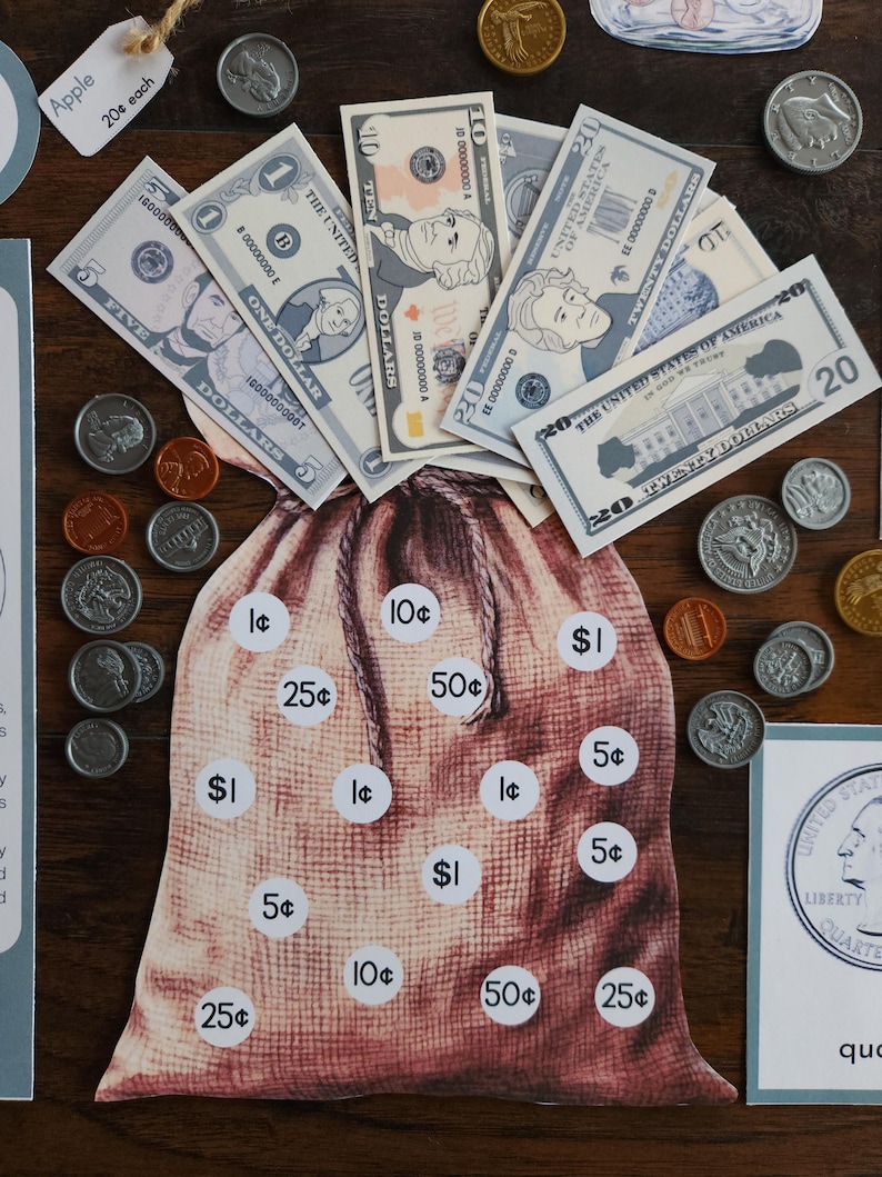 May include: A printed money bag illustration featuring white circles with currency values including 1&cent;, 5&cent;, 10&cent;, 25&cent;, 50&cent;, and $1. The bag is surrounded by various United States paper banknotes and metal coins, including pennies, nickels, dimes, and quarters.