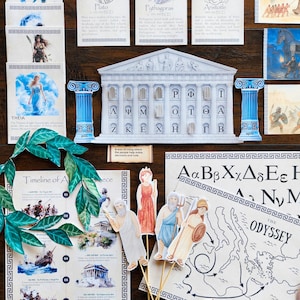 May include: A collection of educational materials on a wooden surface. Includes illustrations of Greek philosophers, a temple, a map of The Odyssey, and a timeline of ancient Greece. The color palette is primarily white, blue, and beige.