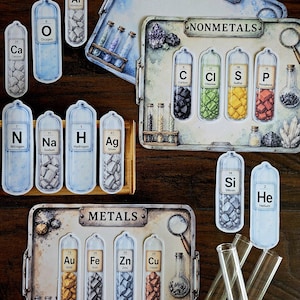 May include: A collection of educational science-themed illustrations featuring elements from the periodic table. The artwork includes labels for gases, nonmetals, and metals, with detailed depictions of each element in glass vials. The color palette includes blues, greens, yellows, and browns.