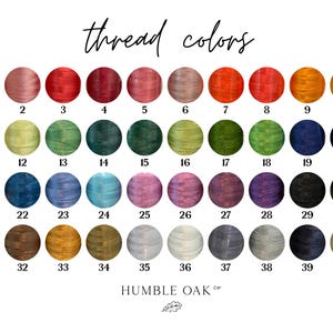 May include: A color chart titled thread colors featuring forty numbered circular swatches of embroidery thread in various shades including red, pink, orange, yellow, green, blue, purple, brown, gray, black, and white, with the text HUMBLE OAK CO.