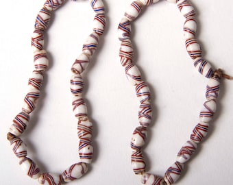 Antique strand of French Cross trade beads 20 cms 20 beads
