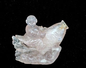 19th Century Chinese rose quartz figure riding a dolphin bottle