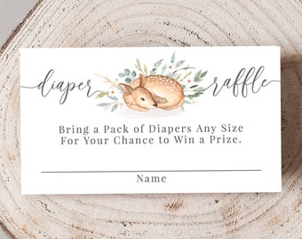 May include: A white card with a watercolor illustration of a fawn sleeping on a bed of green leaves. The text "diaper raffle" is written in cursive at the top of the card. The text "Bring a Pack of Diapers Any Size For Your Chance to Win a Prize." is written below the illustration. The text "Name" is written at the bottom of the card.