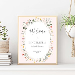 May include: A pink floral welcome sign with the text "Welcome to Madeline's Bridal Shower September 24, 2020".