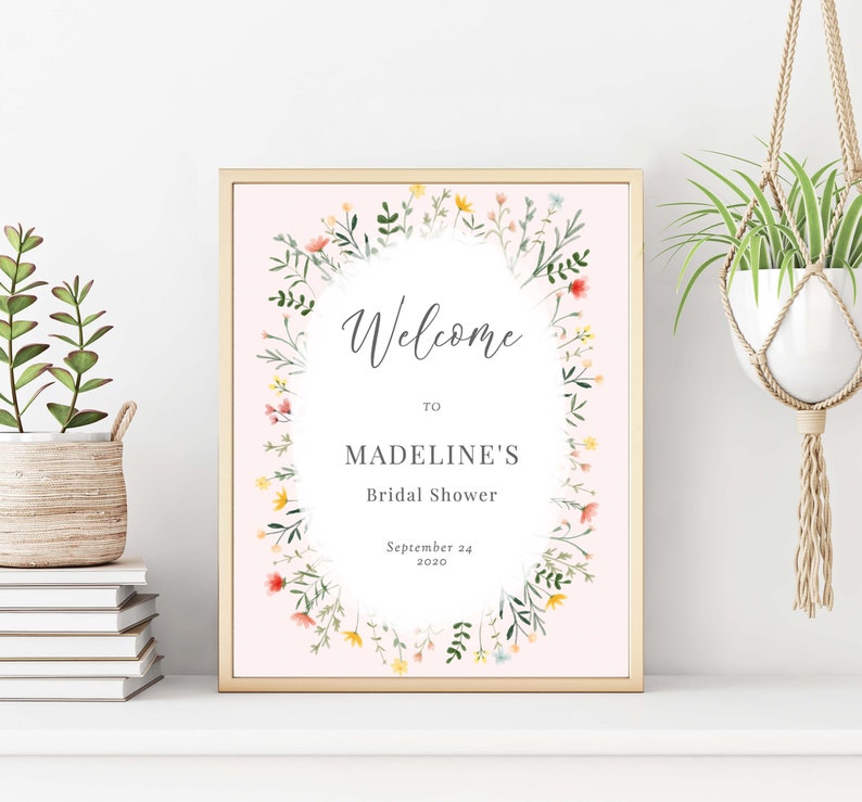 May include: A pink floral welcome sign with the text "Welcome to Madeline's Bridal Shower September 24, 2020".
