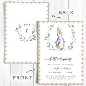 May include: A baby shower invitation with a watercolor illustration of a bunny rabbit wearing a blue jacket. The invitation is for a baby girl named Gracie Archer and includes the date and time of the event, as well as the address and registry information. The text on the invitation reads "A little bunny Will Be Here Soon! Join Us to Honor Gracie Archer Saturday August 12 | 2-4PM Hillcrest Manor Estate Garden Terrace 2405 57th Bend Avenue Ft Worth, Tx 84953. Gracie is registered on amazon.com We hope to see you there!"